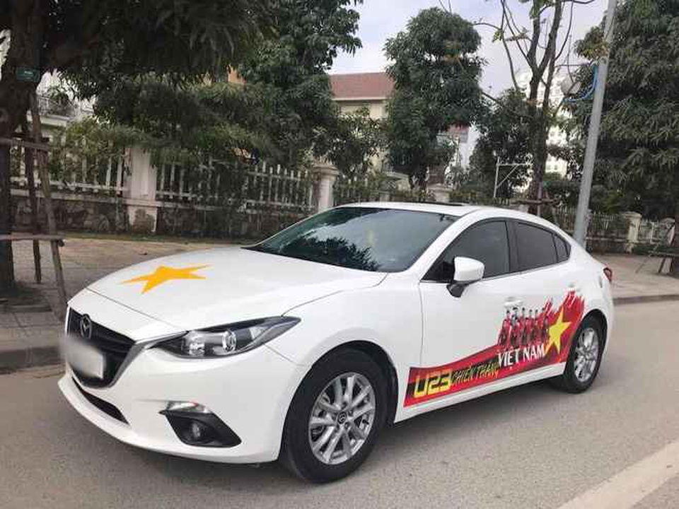 Hàng loạt xe "thay áo" Quốc kỳ tiếp lửa U23 Việt Nam trước chung kết - 12 Hàng loạt xe "thay áo" Quốc kỳ tiếp lửa U23 Việt Nam trước chung kết - 12
