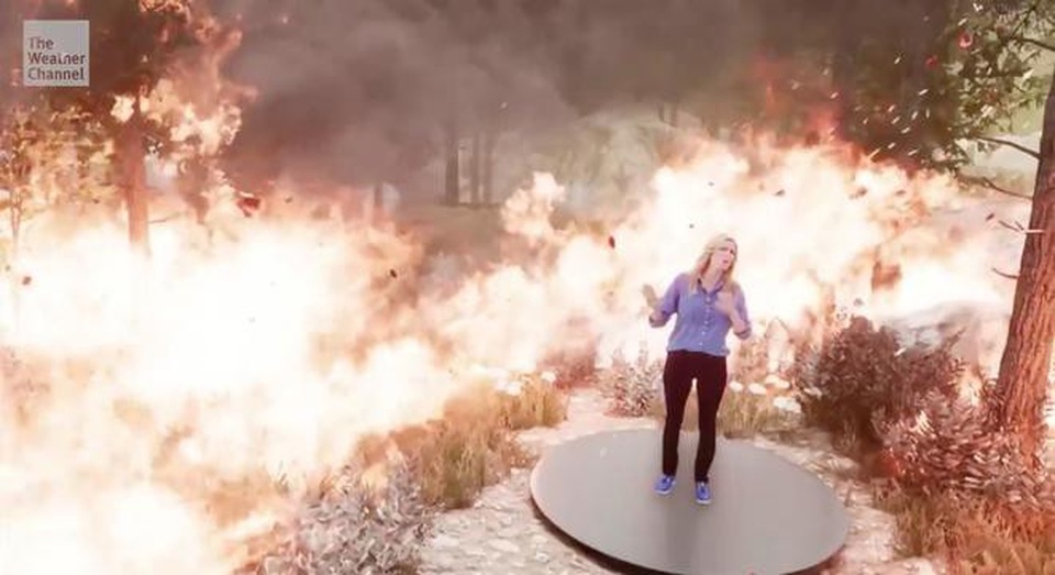 Kênh truyền hình Mỹ “nhấn chìm” MC trong biển lửa cháy rừng bằng công nghệ 3D - 1 Người dẫn chương trình bị nhấn chìm trong biển lửa cháy rừng nhờ công nghệ hiện đại (Ảnh: The Weather Channel)