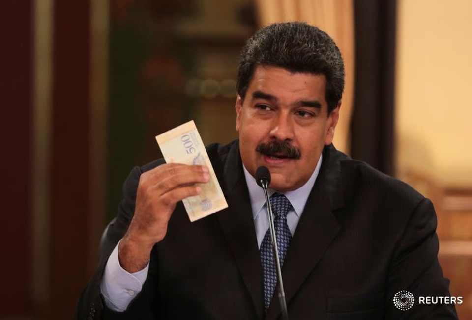 Dân Venezuela chán nản khi lương giám đốc ngang lương bảo vệ - 2 Hệ thống phân cấp lương của Venezuela đã bị bóp méo sau khi ông Maduro tăng mức lương tối thiểu. (Nguồn: Reuters)