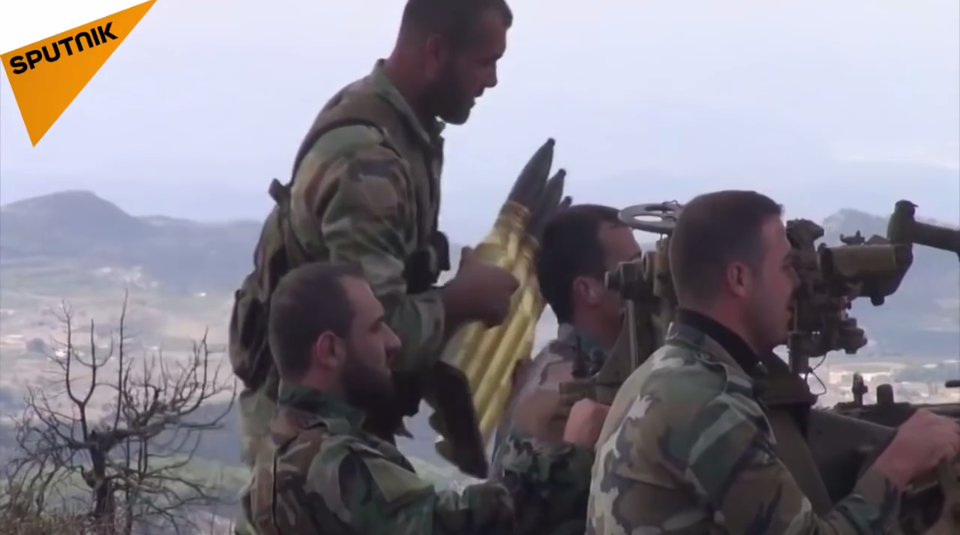 Syria dồn dập nã hỏa lực đáp trả khủng bố phóng tên lửa vào thường dân - 1 Quân nhân Syria (Ảnh: Sputnik)