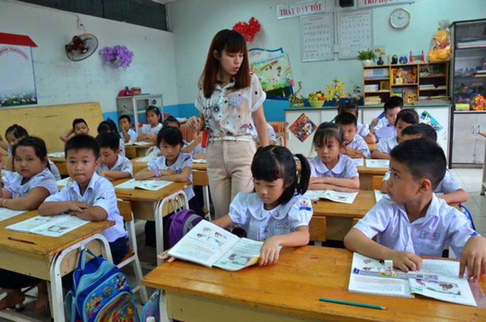 Sinh viên trung cấp, cao đẳng sư phạm về đâu? - 1
Hơn 160.000 giáo viên tiểu học sẽ được nâng chuẩn. (Ảnh: Tấn Thạnh)