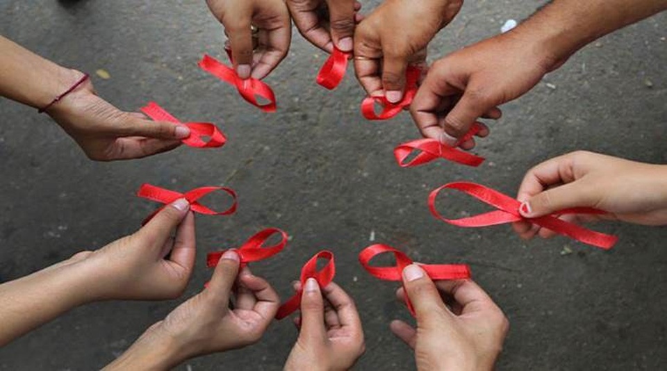 Cùng toàn cầu gây quỹ chống đại dịch AIDS - Ảnh 1. Cùng toàn cầu gây quỹ chống đại dịch AIDS - Ảnh 1.