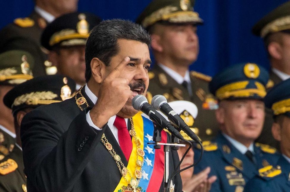 Tổng thống Venezuela chỉ đích danh quan chức Mỹ âm mưu ám sát - 1
Tổng thống Nicolas Maduro phát biểu tại lễ duyệt binh hồi tháng 8 khi xảy ra vụ tấn công bằng máy bay không người lái chứa bom. (Ảnh: EPA)