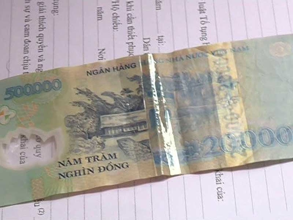 Cảnh giác chiêu biến tờ 20.000 đồng thành 500.000 đồng - Ảnh 1. Cảnh giác chiêu biến tờ 20.000 đồng thành 500.000 đồng - Ảnh 1.