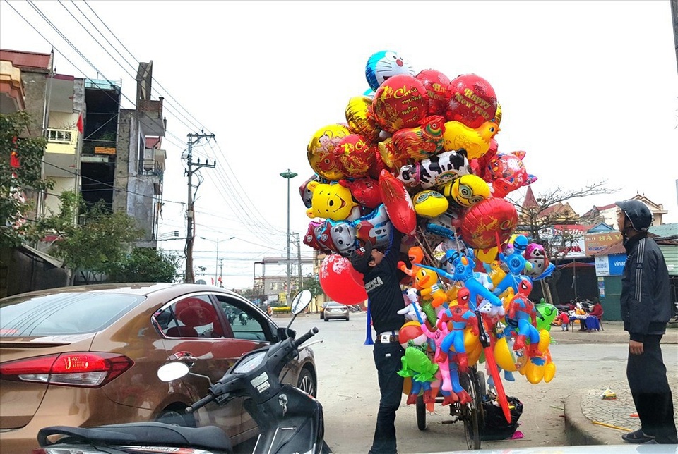 Miệt mài mưu sinh trên phố ngày Tết - 2