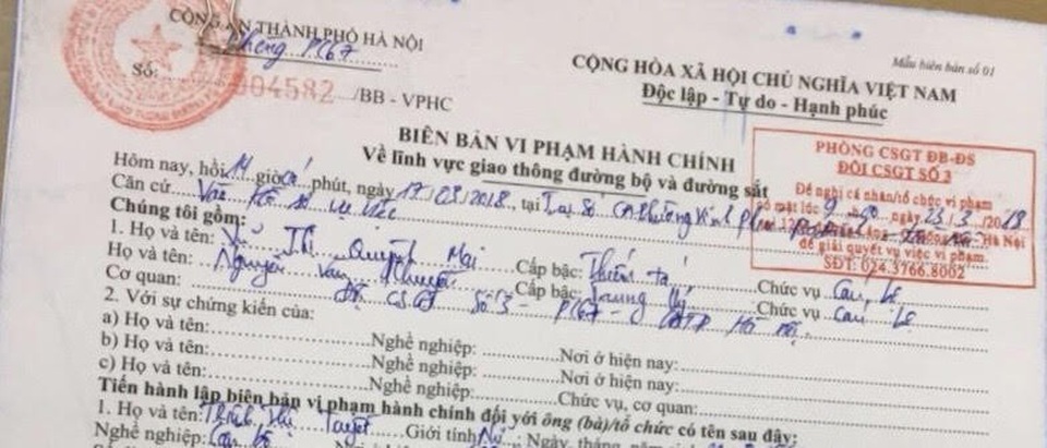 Tước bằng lái, phạt hơn 1,3 triệu đồng nữ tài xế quay xe trên cầu - 2 Biên bản xử lý vi phạm đối với bà Trịnh Thị Tuyết