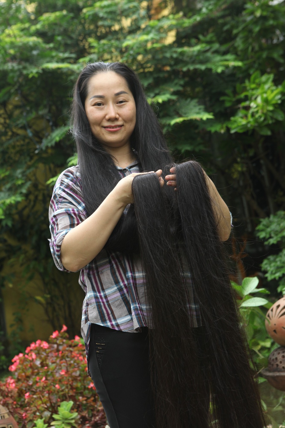 Người phụ nữ có mái tóc dài nhất Việt Nam: 