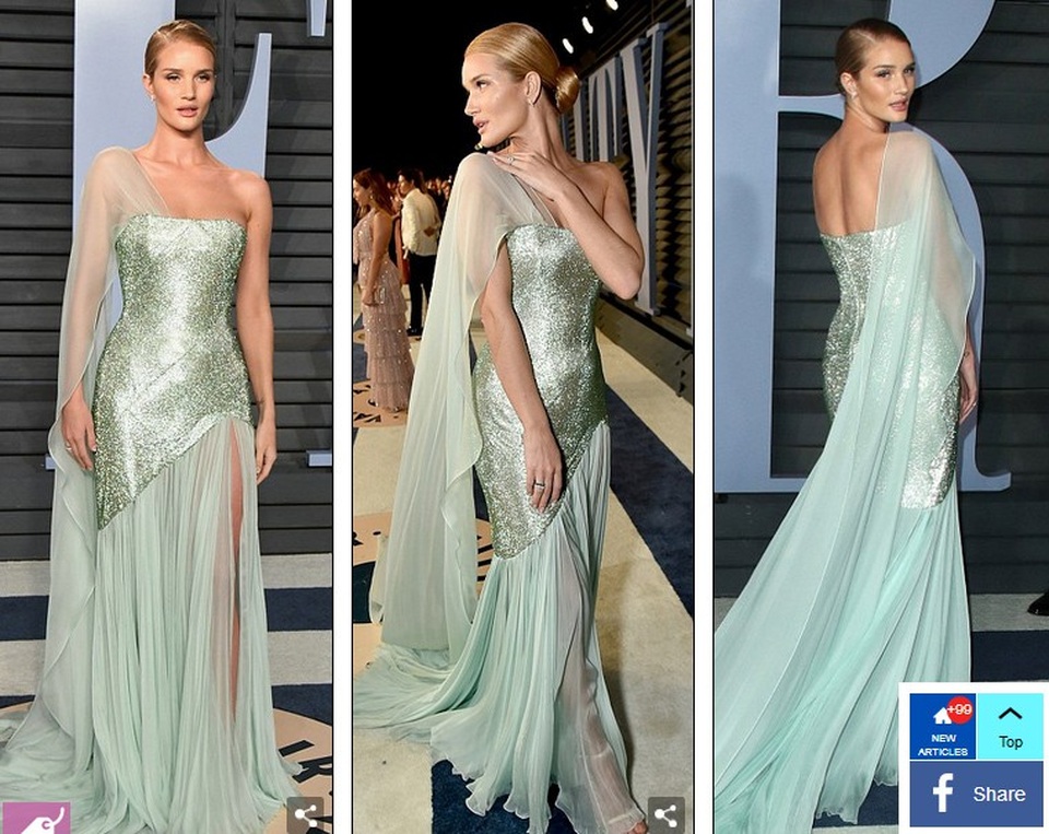 Choáng váng với người đẹp phô trọn "vòng một" trong tiệc Oscar - 8
Rosie Huntington-Whiteley đẹp sang trọng và yêu kiều