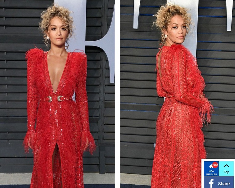 Choáng váng với người đẹp phô trọn "vòng một" trong tiệc Oscar - 13
Ca sỹ Rita Ora