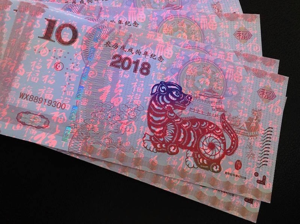Bỏ túi 500 triệu đồng nhờ bán tiền có hình con chó - 4 Tiền Macau mệnh giá 10 và 100 năm 2018