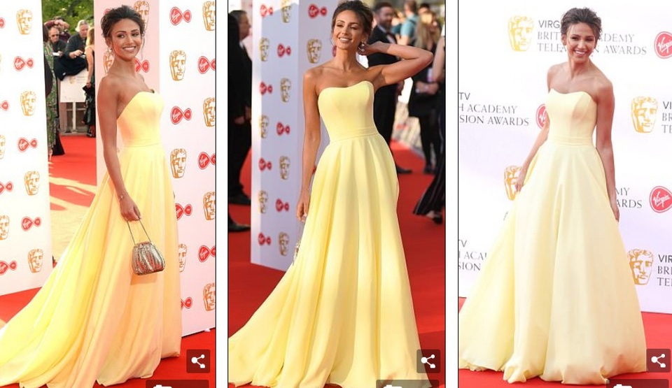 Abbey Clancy hở nửa bầu ngực khi dự lễ trao giải của truyền hình Anh - 10
Michelle diện đầm dạ hội của Suzanne Neville