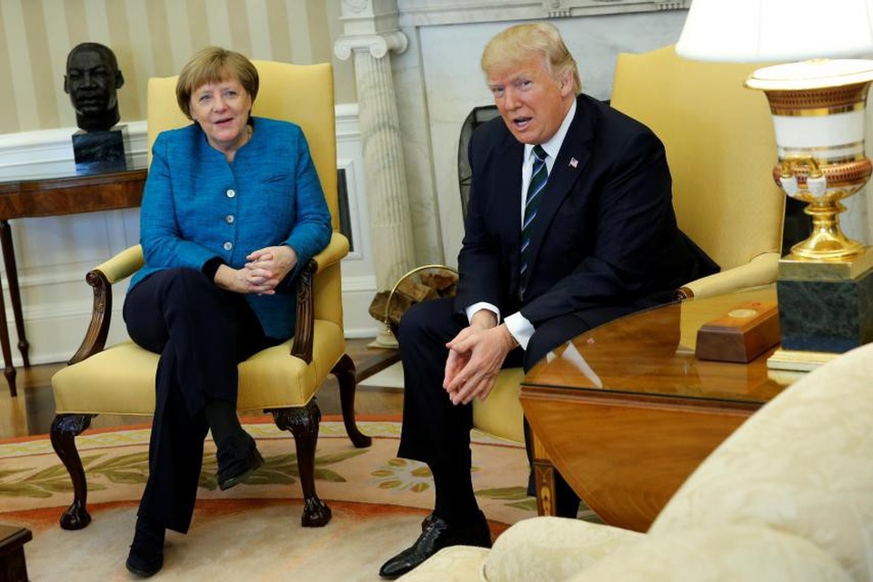 Ông Trump hỏi ý kiến bà Merkel về cách cư xử với ông Putin - 1 Thủ tướng Angela Merkel và Tổng thống Mỹ Donald Trump (Ảnh: Reuters)