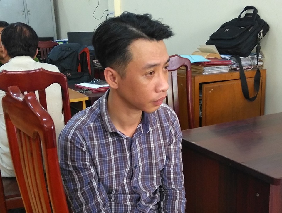 Đối tượng Huỳnh Trí Dũng tại cơ quan công an