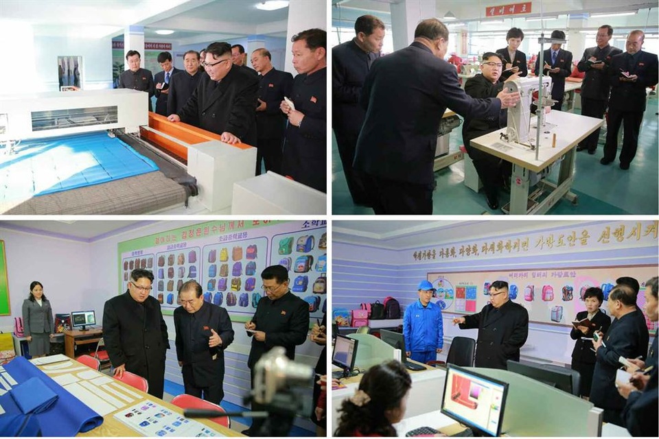Mô hình đại học nhà máy đặc biệt tại Triều Tiên - 1 Ông Kim Jong-un tới thăm một nhà máy túi tại Bình Nhưỡng (Ảnh: Yonhap)