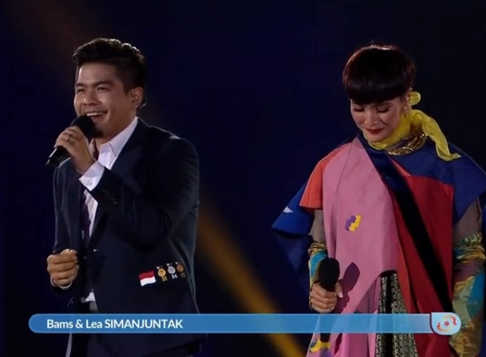 Lễ bế mạc Asiad 18: Bữa tiệc âm nhạc rộn ràng - 7
Cặp ca sĩ của Indonesia: Bams và Lea Simanjuntak