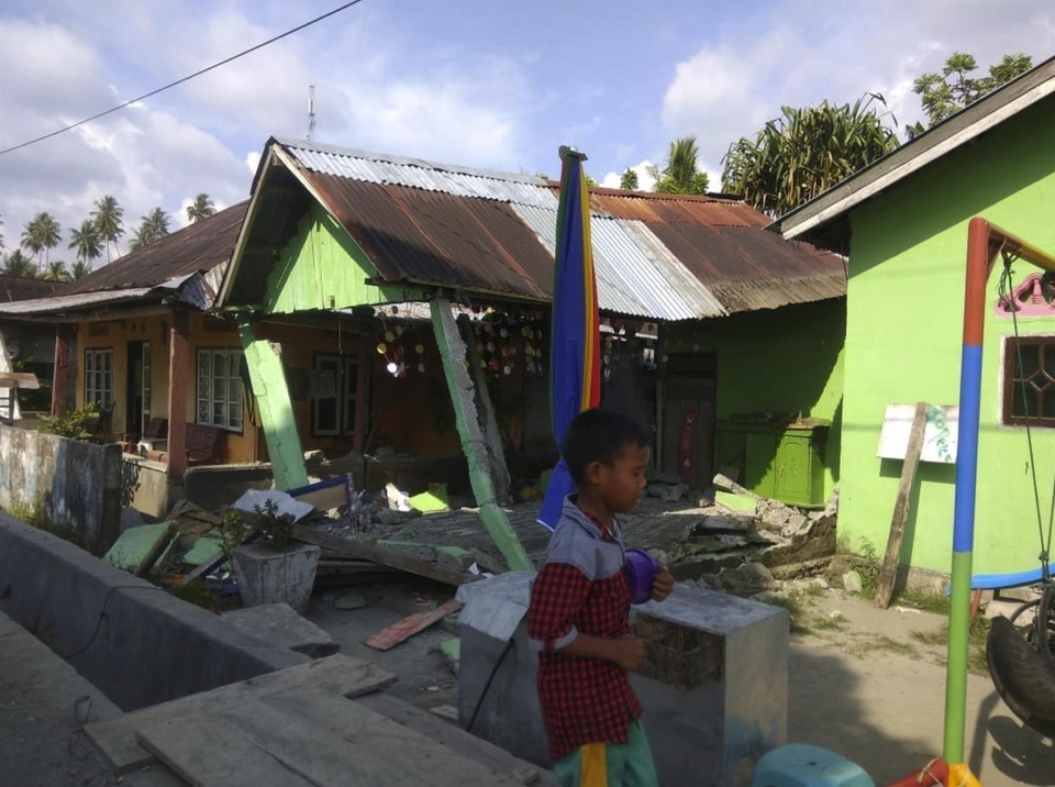 Động đất mạnh kéo theo sóng thần tại Indonesia - 4
(Ảnh: AFP)