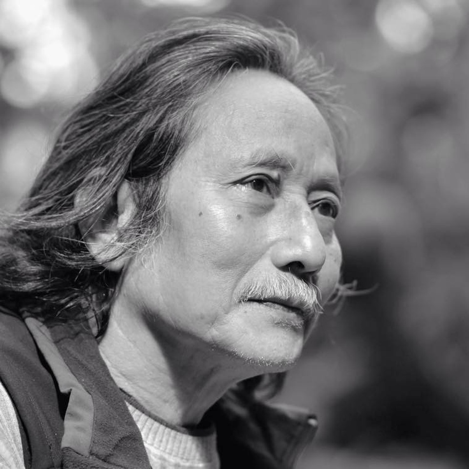 Chân dung nghệ sĩ - nhiếp ảnh gia Lê Quang Châu.