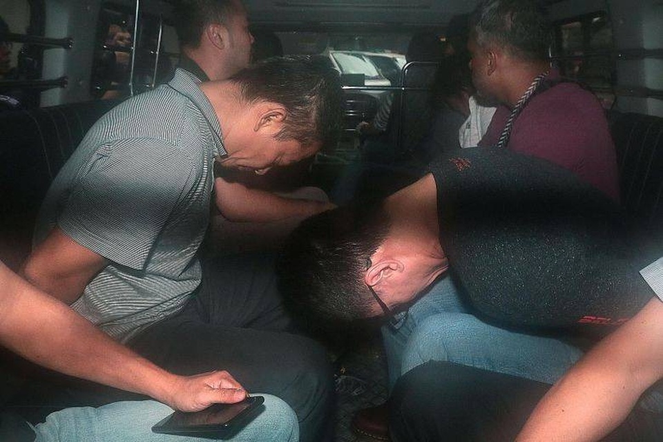 Các bị cáo trong đường dây trộm dầu của Singapore ra tòa hôm 13/1 (ảnh: Reuters)