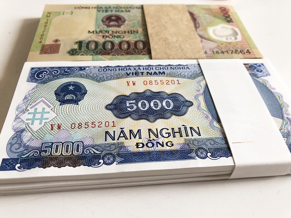 Càng cận Tết, phí đổi tiền mới càng tăng, có nơi đòi 70% - 1 Càng cận Tết, phí đổi tiền mới càng tăng, có nơi đòi 70% - 1