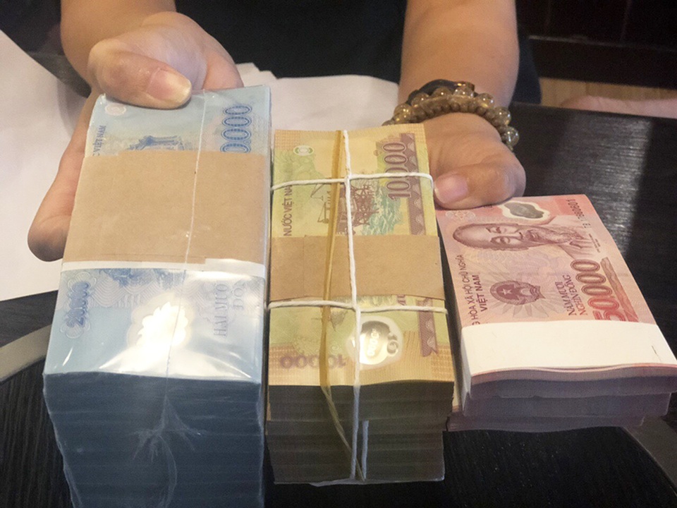 Càng cận Tết, phí đổi tiền mới càng tăng, có nơi đòi 70% - 2 Càng cận Tết, phí đổi tiền mới càng tăng, có nơi đòi 70% - 2
