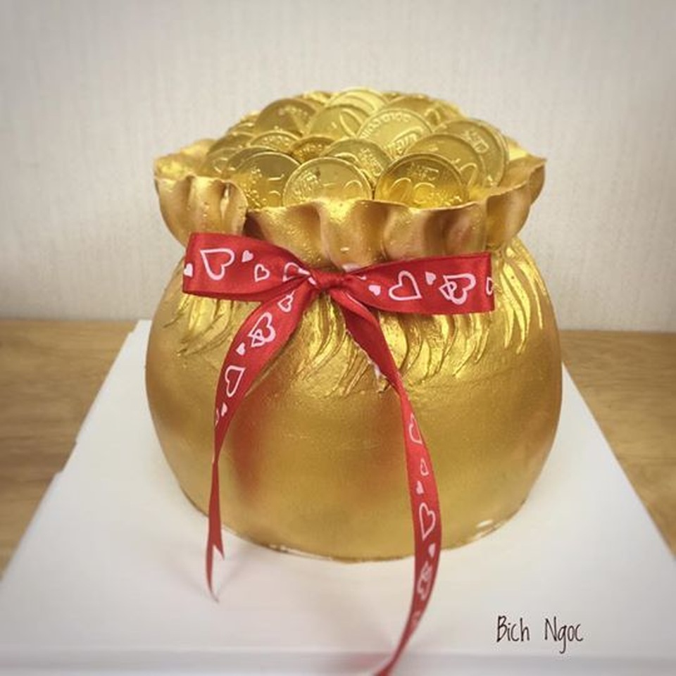 Heo vàng thần tài bán chạy hơn cả vàng nhẫn - 8 Heo vàng thần tài bán chạy hơn cả vàng nhẫn - 8