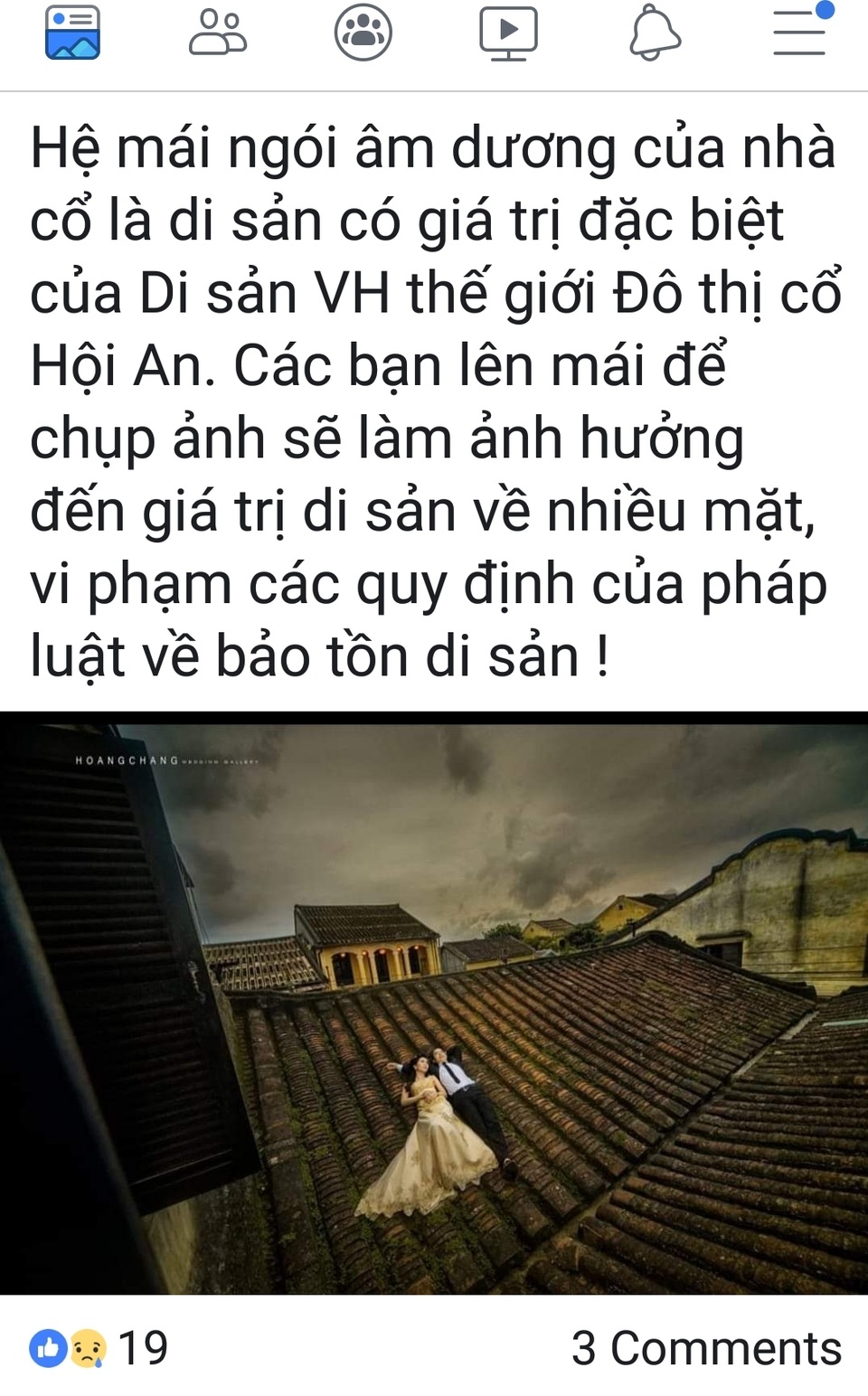 Bạn trẻ chụp ảnh cưới trên mái nhà cổ Hội An Bạn trẻ chụp ảnh cưới trên mái nhà cổ Hội An