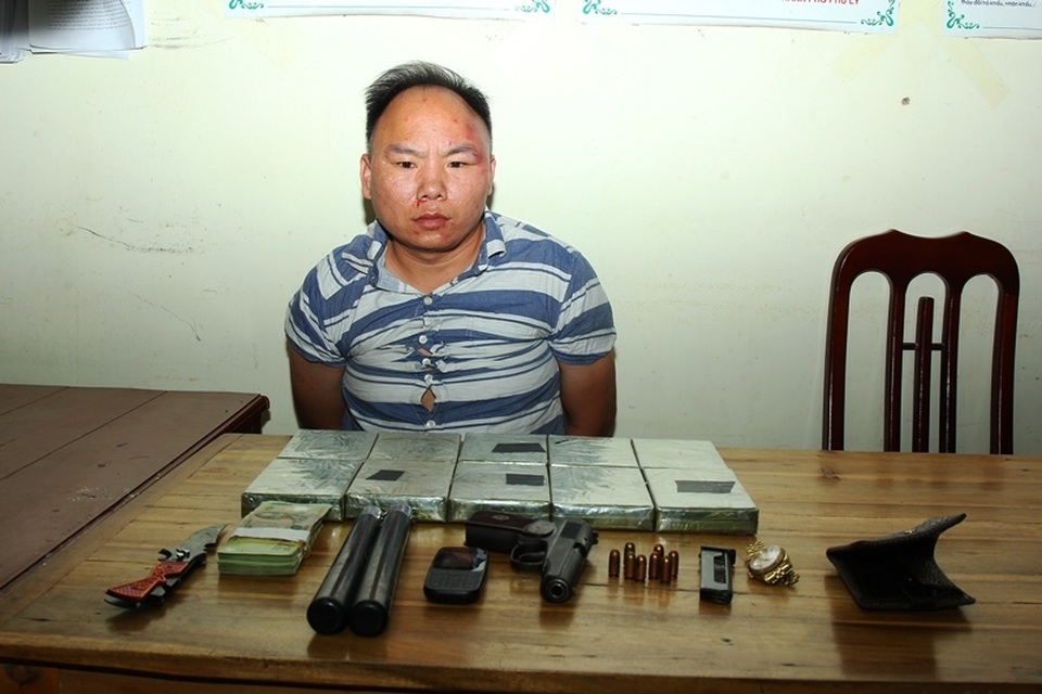 Bắt giữ đối tượng mang súng K59 vận chuyển 10 bánh heroin - 2 Bắt giữ đối tượng mang súng K59 vận chuyển 10 bánh heroin - 2