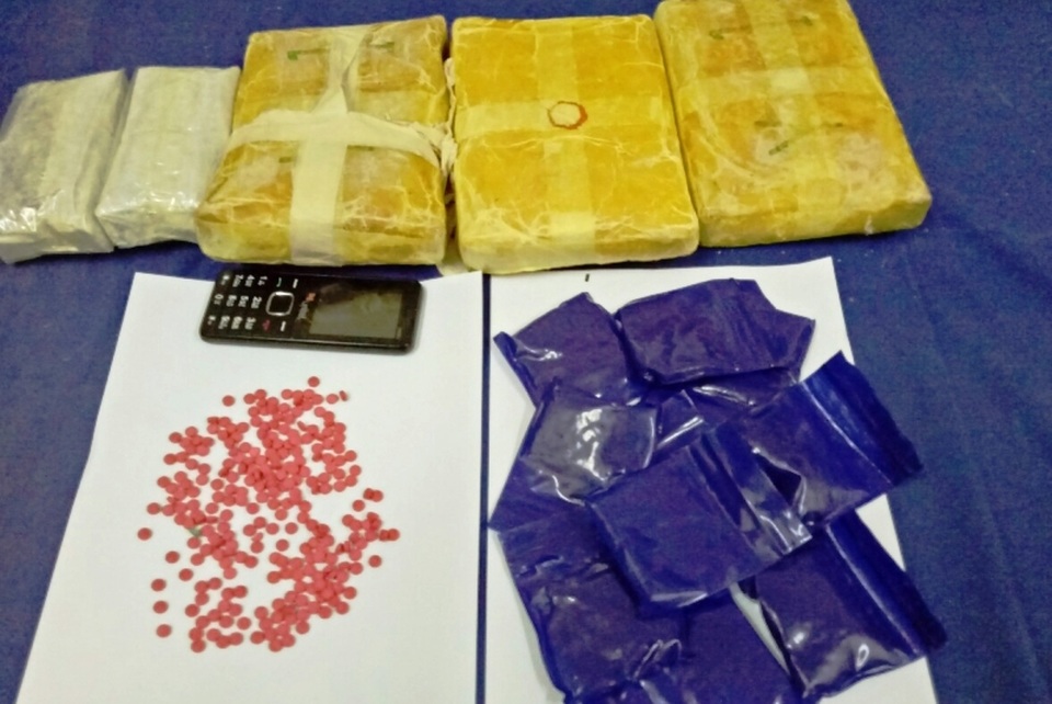 Bắt giữ đối tượng mang súng K59 vận chuyển 10 bánh heroin - 4 Bắt giữ đối tượng mang súng K59 vận chuyển 10 bánh heroin - 4