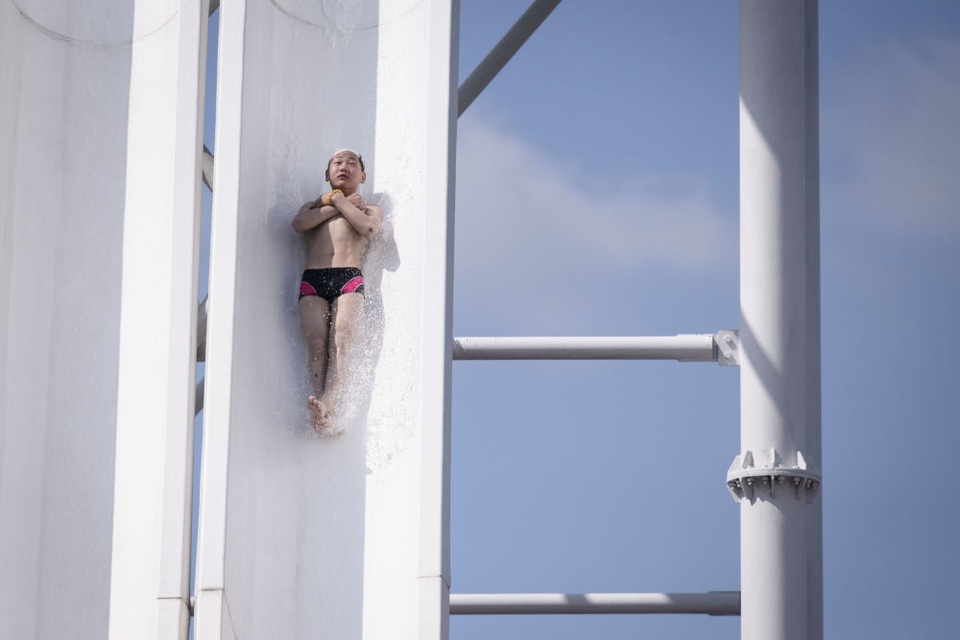 Người dân Triều Tiên giải nhiệt dưới cái nắng đổ lửa mùa hè thế nào? - 9