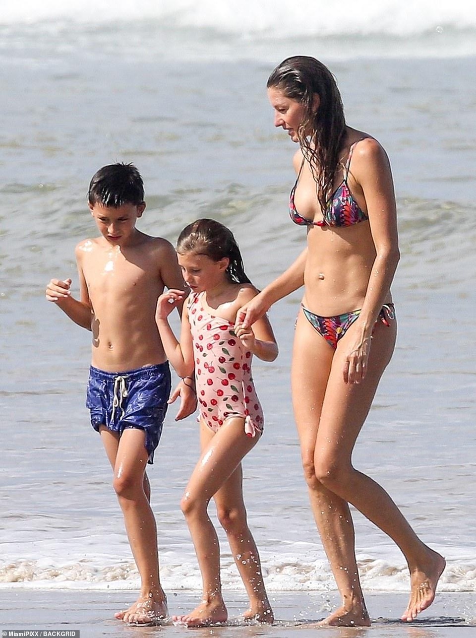 Gisele Bundchen tình tứ bên chồng - 11 Gisele Bundchen tình tứ bên chồng - 11