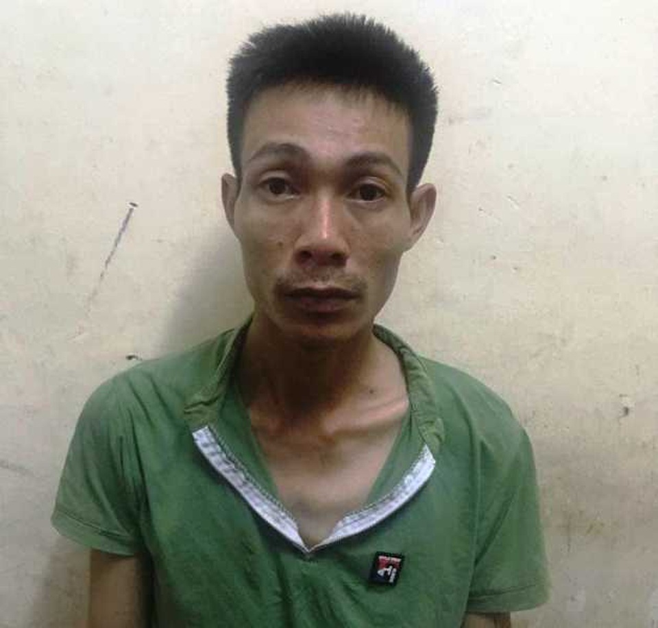 Khởi tố bị can vụ cha dùng thanh sắt chốt cửa đánh 2 con nguy kịch - 1