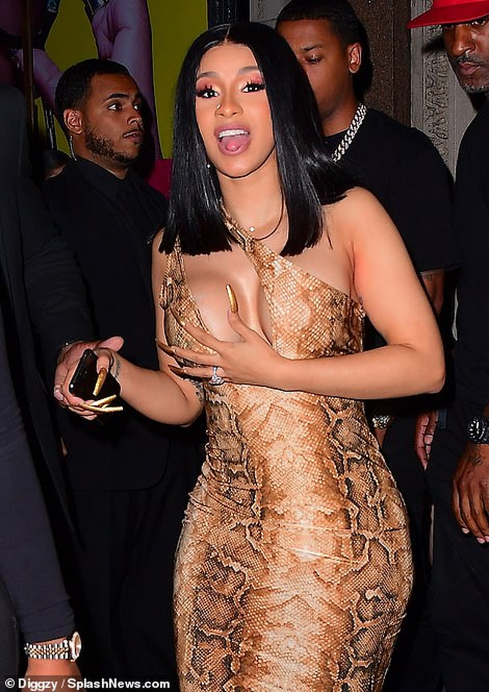 Cardi B almost exposed her bust because of her revealing dress - 1