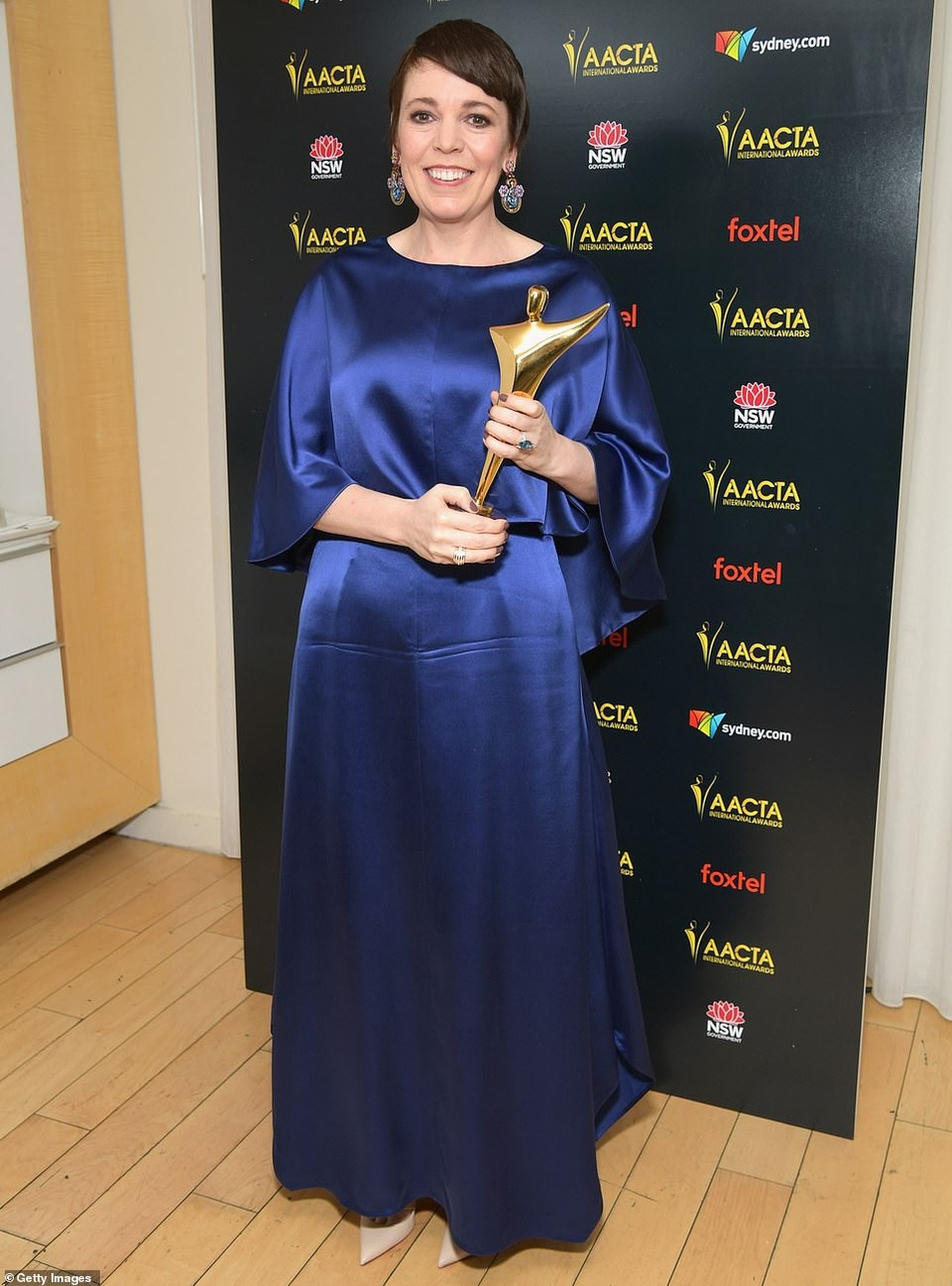 Emily Blunt lộng lẫy với váy vàng - Ảnh 20.