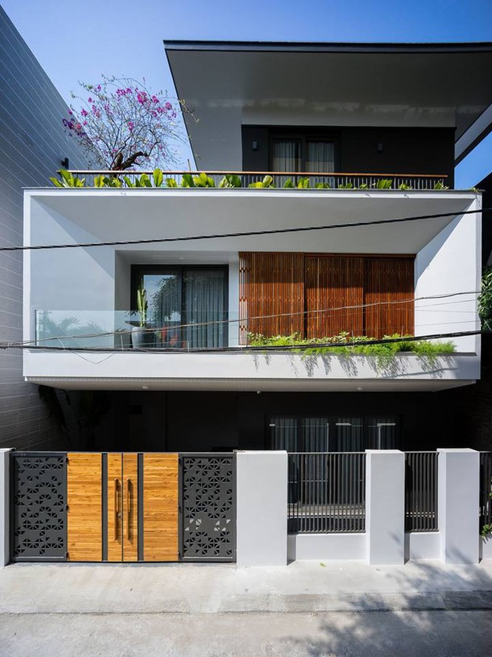 Kiểu biệt thự 3 tầng mới lạ có vẻ đẹp thôi miên - 1 Kiểu biệt thự 3 tầng mới lạ có vẻ đẹp thôi miên - 1