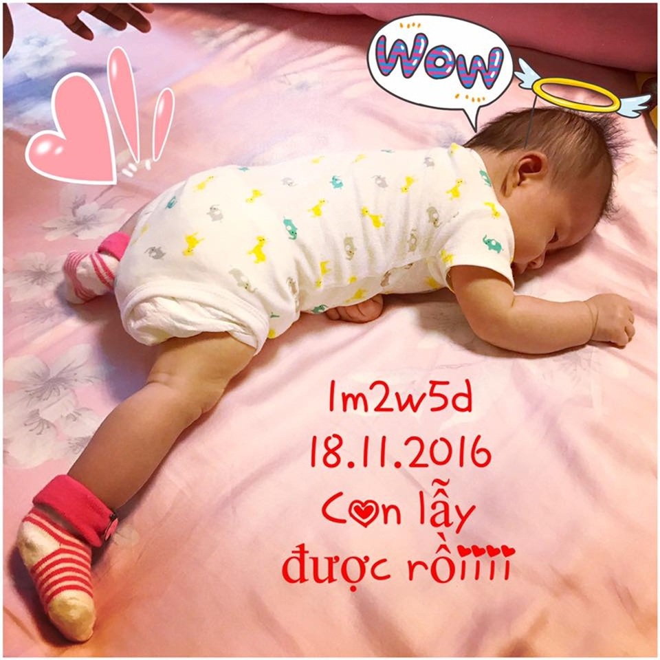 Á hậu Diễm Trang bật mí bí quyết vòng eo “mi nhon” một tháng sau sinh - 4 Hình ảnh con gái được Diễm Trang chia sẻ một cách kín đáo.