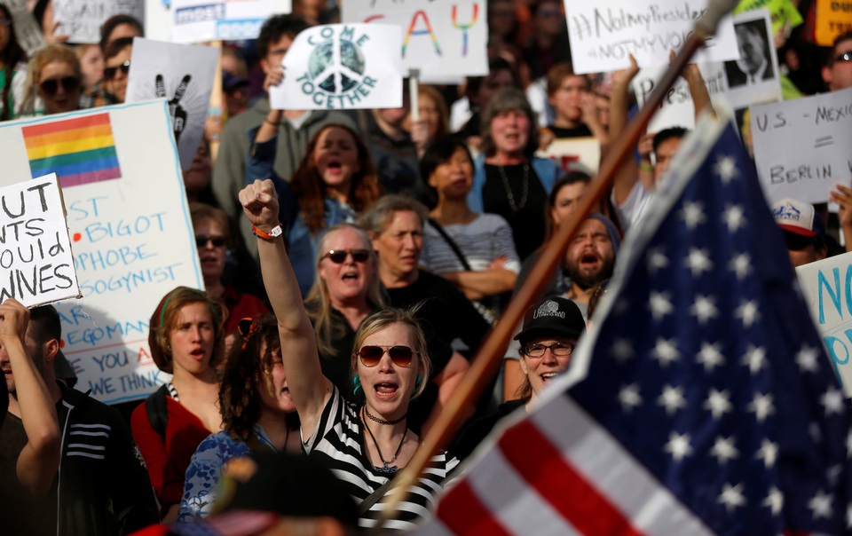 Biểu tình phản đối ông Trump đắc cử tiếp tục lan rộng tại Mỹ - 12