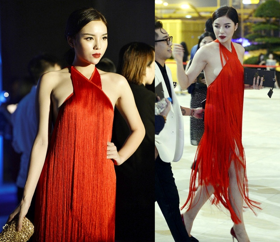 Hoa hậu Đỗ Mỹ Linh, Kỳ Duyên, Huyền My lọt top sao xấu; Sơn Tùng M-TP thảm họa thời trang - 9 Nỗ lực lấy lại hình ảnh của Hoa hậu Kỳ Duyên dường như vẫn chưa có kết quả. Người đẹp liên tục “mất điểm” bằng những bộ cánh hở bạo kém duyên, và chiếc đầm tua rua đỏ này cũng không ngoại lệ. Khi di chuyển, nếu không chú ý người đẹp sẽ rất dễ lâm vào cảnh “hớ hênh”.