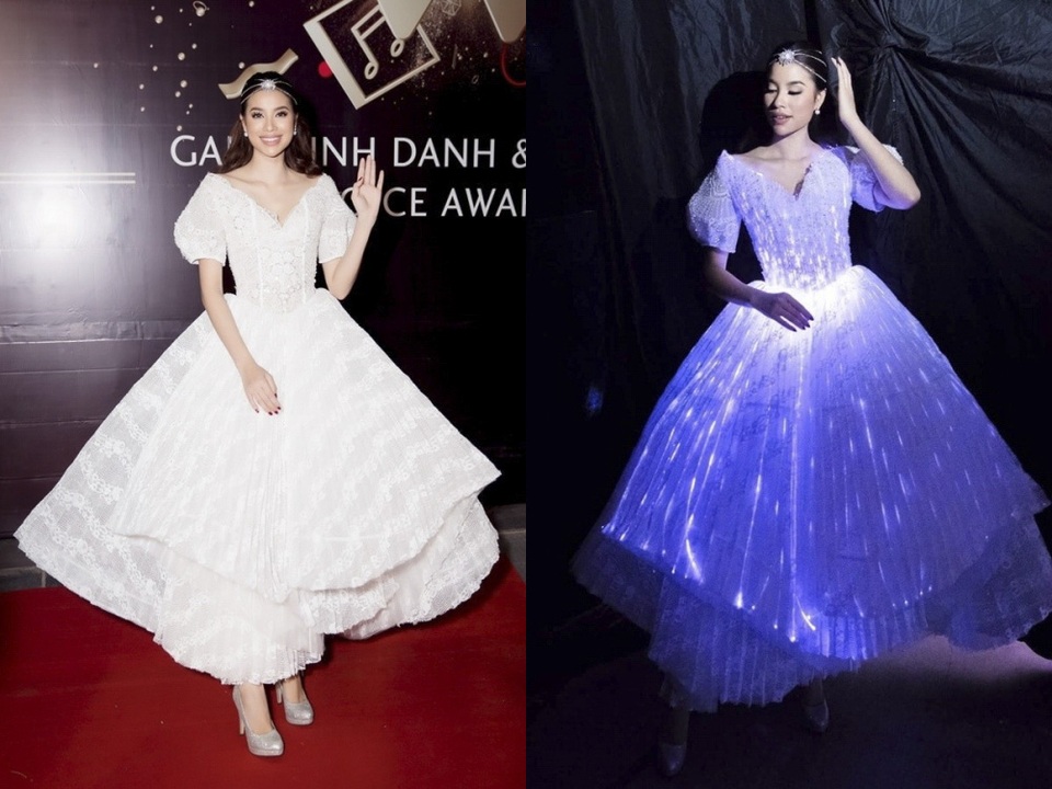 Hoàng Thuỳ, Phạm Hương mặc đẹp với váy phát sáng; Linh Chi hở bạo kém duyên - 2 Phạm Hương trung thành với thiết kế đầm xoè kiểu công nương, được dập li xếp lớp ấn tượng, kết hợp cùng tóc xoăn gọn và cài đầu đính đá. Trong bóng tối, bộ váy phát ra ánh sáng xanh dịu nhẹ rất vừa mắt.