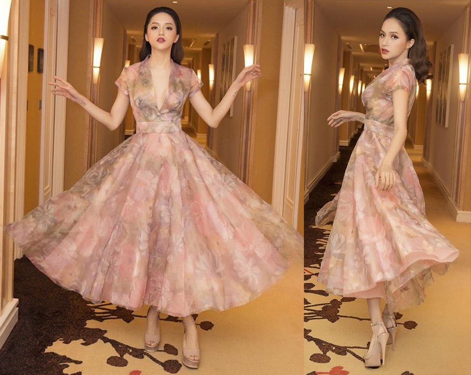 Hoàng Thuỳ đẹp nhất tuần; Thái Trinh diện trang phục lộ vòng 1 "xập xệ" lọt top sao xấu - 2 Hoa hậu Hương Giang diện lại 1 thiết kế cũ của Hà Hồ trong “Cả một trời thương nhớ”. Cách thắt eo, cổ xẻ cài khuy và nhất là phần tay lửng kín đáo mang đến cho người đẹp vẻ ngoài vừa cổ điển vừa sang trọng.