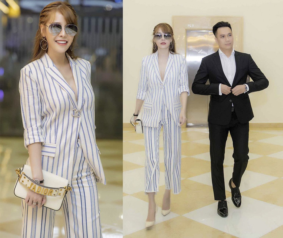 Hậu ồn ào cùng tình cũ, Văn Mai Hương ngày càng xinh đẹp - 9 Quế Vân diện bộ suit kẻ sọc cùng Việt Anh dự sự kiện. Chân dài cài áo hờ hững kheo vòng 1 căng tròn. Tuy nhiên, cách xắn tay áo không khéo cùng với độ dài lưng chừng của chiếc quần có lẽ đều là những điểm trừ khá lớn.