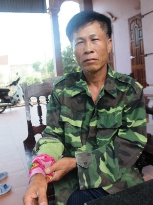 Ông Lê Hải Liên bị thương ở tay trong khi truy bắt tên cướp