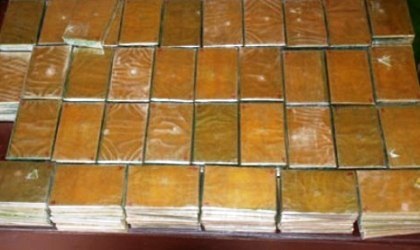 "Bà trùm" ma túy trong đường dây 140 bánh heroin sa lưới - 2 140 bánh heroin mà đối tượng Đông đùng xế hộp áp tải.
