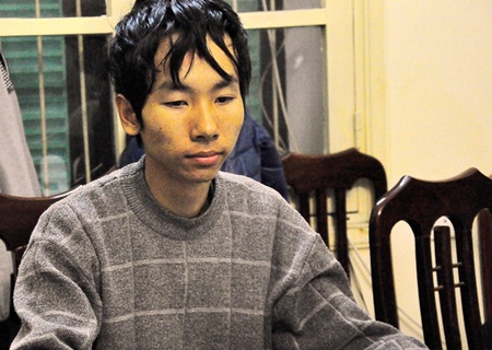 Nguyễn Văn Đạt khi bị bắt.