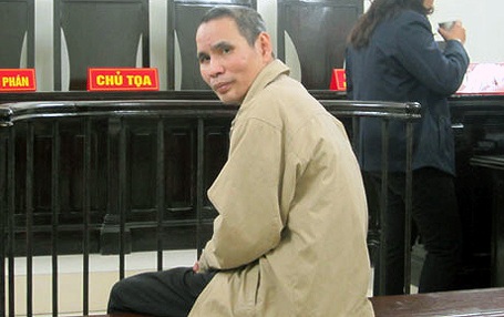 Án chung thân cho người chồng ném vợ bại liệt xuống sông - 1 Nguyễn Kim Đức tại phiên tòa ngày 20/1.