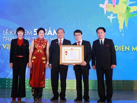 VietnamPlus tròn 5 tuổi và đón nhận Huân chương lao động hạng Ba - 1 Báo Vietnam+ đón nhận Huân chương Lao động hạng Ba