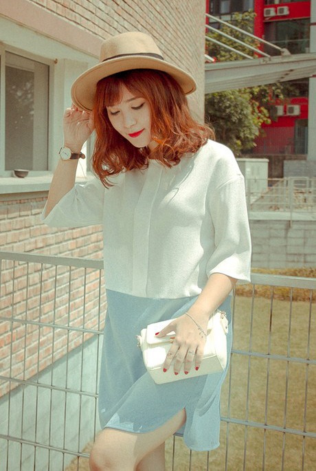 Đón Thu với phong cách đường phố sành điệu, thanh lịch - 23 Những chiếc váy trắng luôn là sự lựa chọn hoàn hảo tạo vẻ sang trọng, lịch lãm.