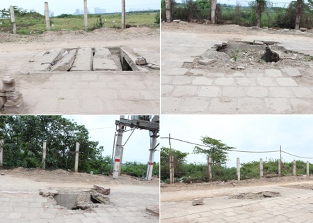 Hố “tử thần” xuất hiện nhan nhản dưới chân đường cao tốc trên cao - 2 Rất nhiều “tử thần” trên vỉa hè thể hiện sự xuống cấp của các công trình xây dựng thành phố,