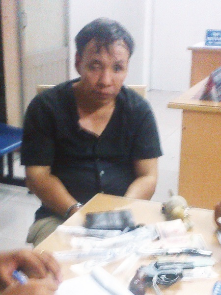 Lê Công Phương cùng tang vật bị thu giữ tại cơ quan công an