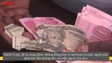 Thợ sửa tiền - cứu tinh cho những đồng USD rách tại Zimbabwe