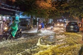 Floodwaters surge through Danang streets